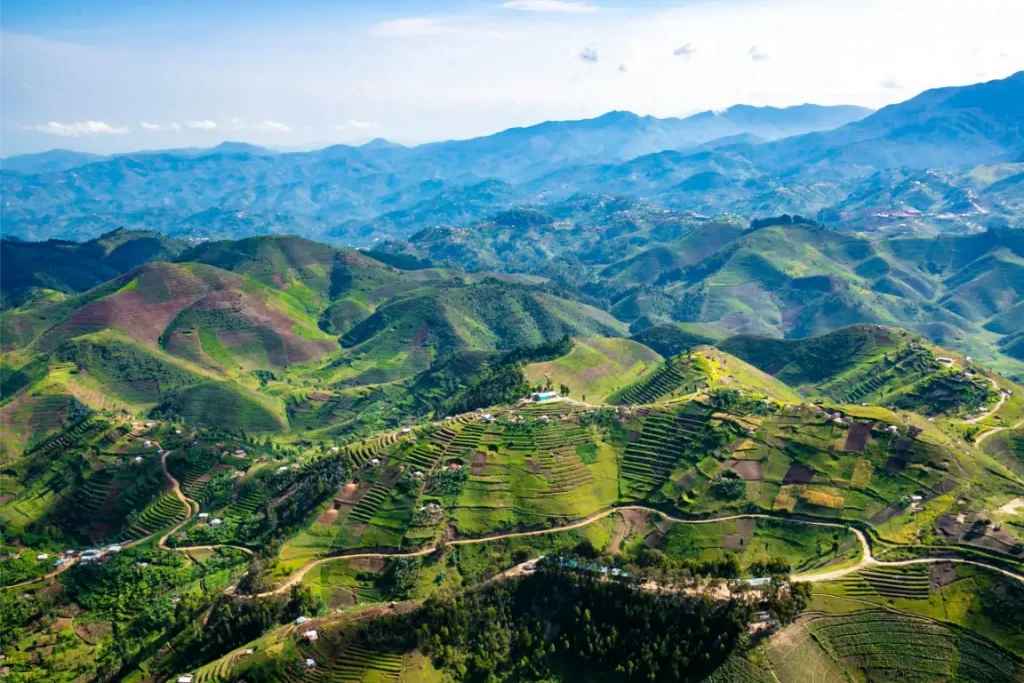 stunning aerial view landscape of green hills and fields in rwanda countryside